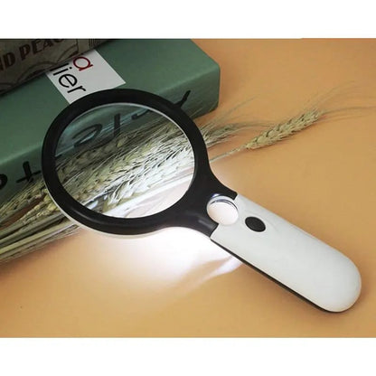 A 10x handheld 3-lamp LED magnifying glass for reading and magnifying jewelry